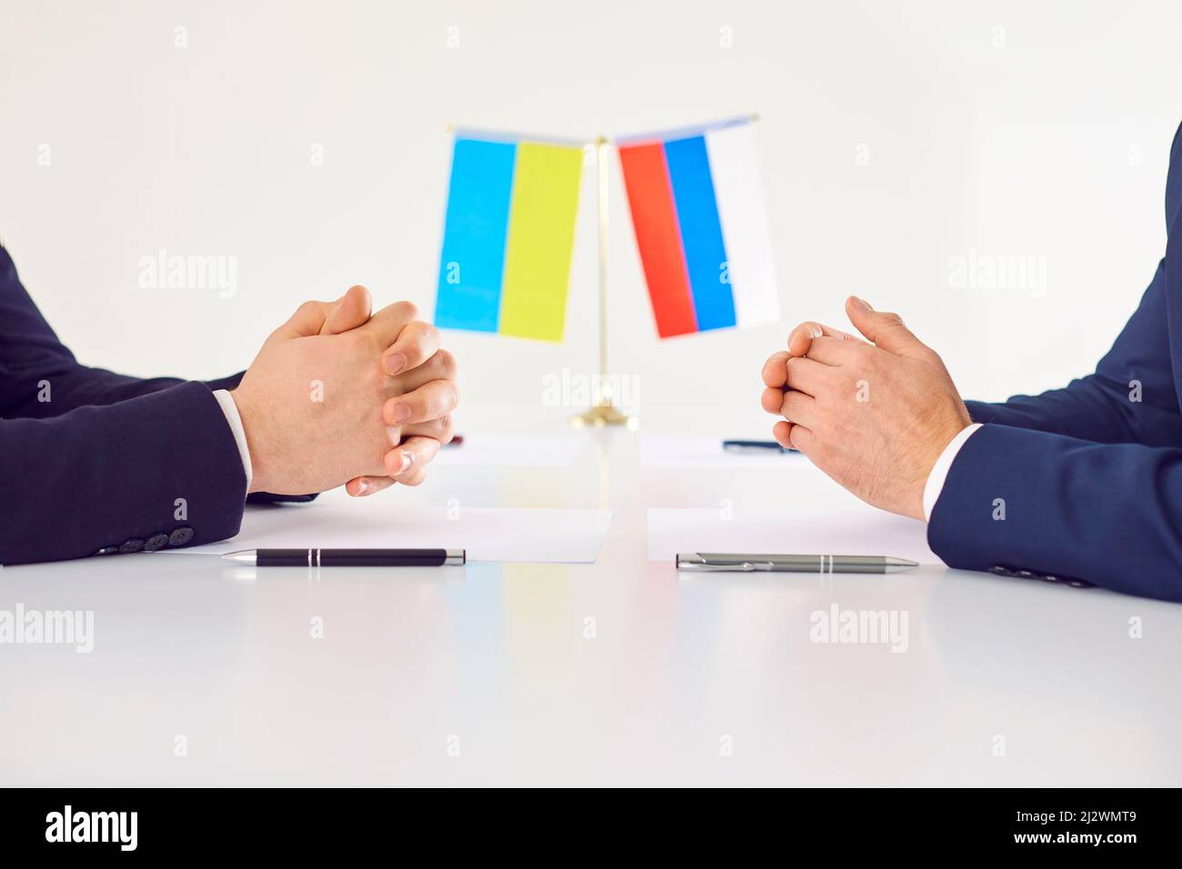 Representatives of Ukraine and Russia negotiating in order to sign peace treaty and stop war Stock Photo