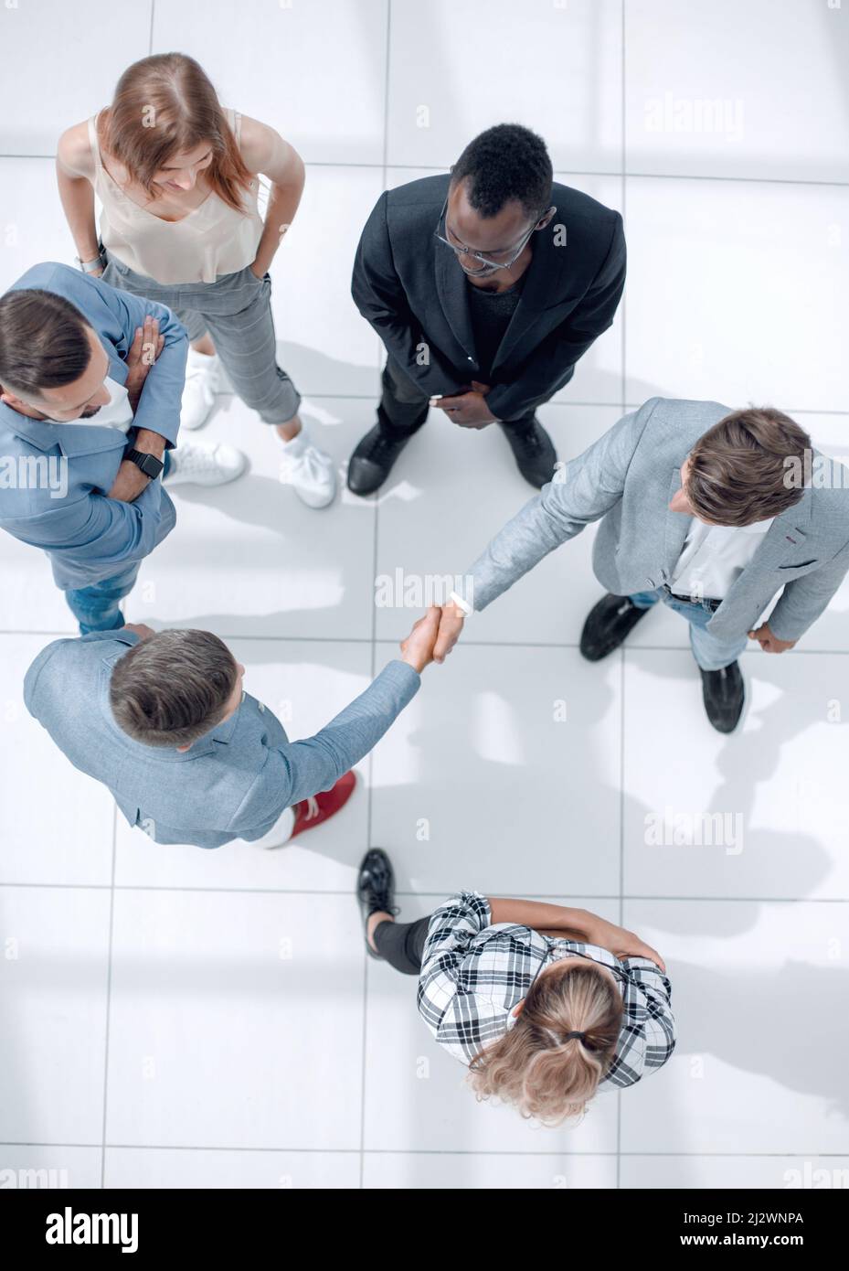 Aerial meeting table handshake hi-res stock photography and images - Alamy
