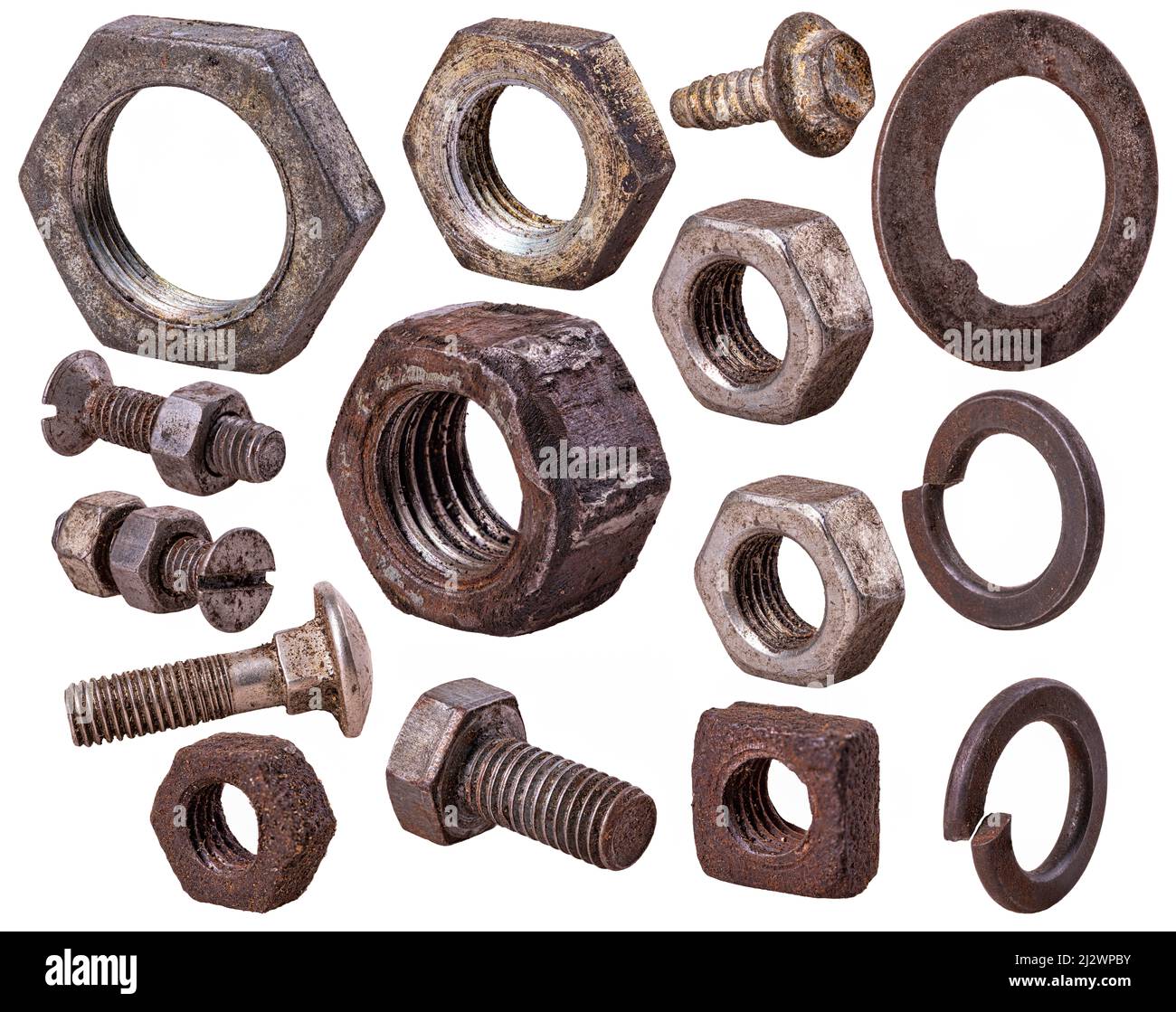 Old nuts and bolts covered with rust. Isolated background Stock Photo
