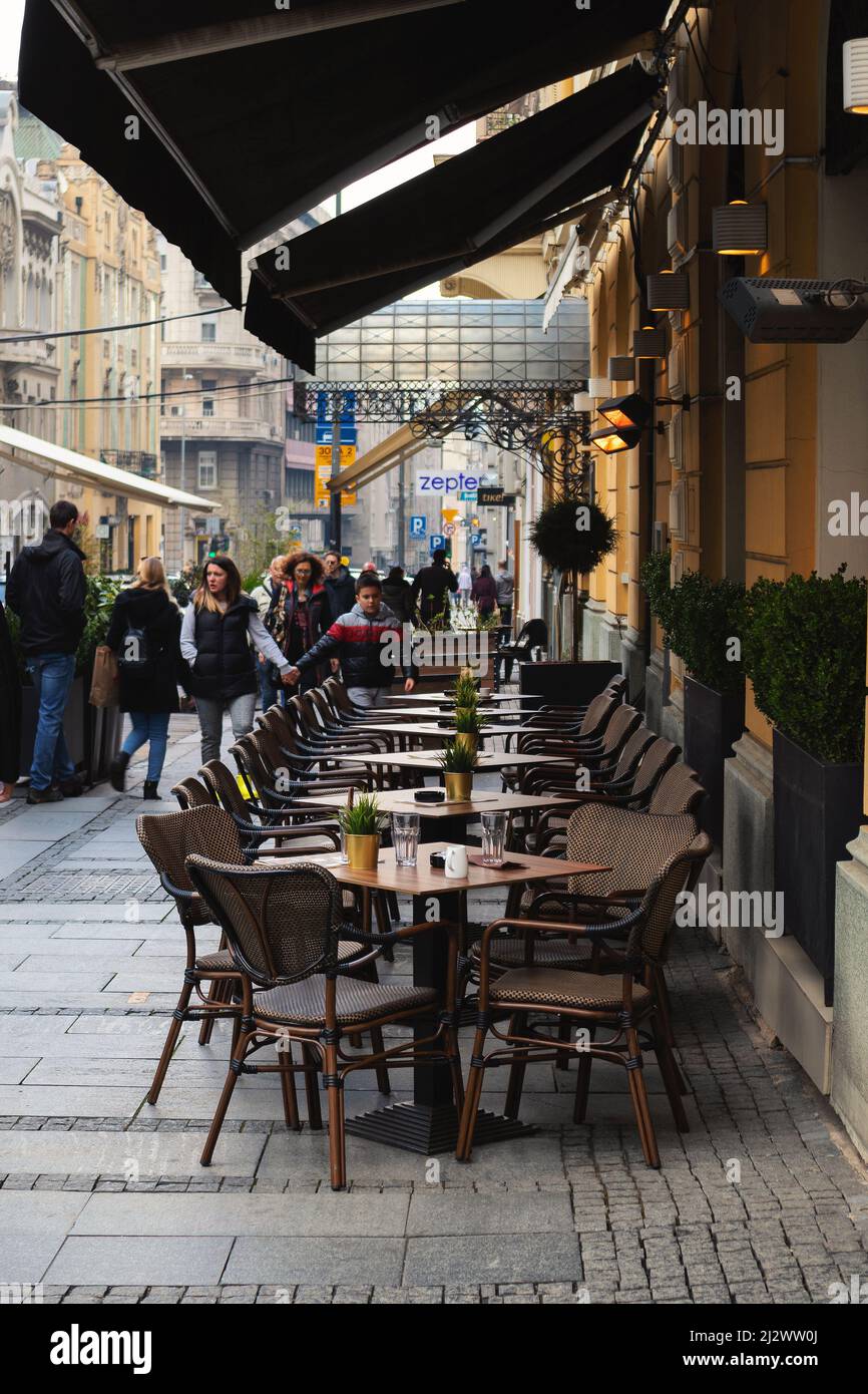 Belgrade, Serbia - April 02, 2022: Knez Mihailova Street, main touristic place in Belgrade, beautiful sidewalks with lot of restaurants and Serbian cu Stock Photo