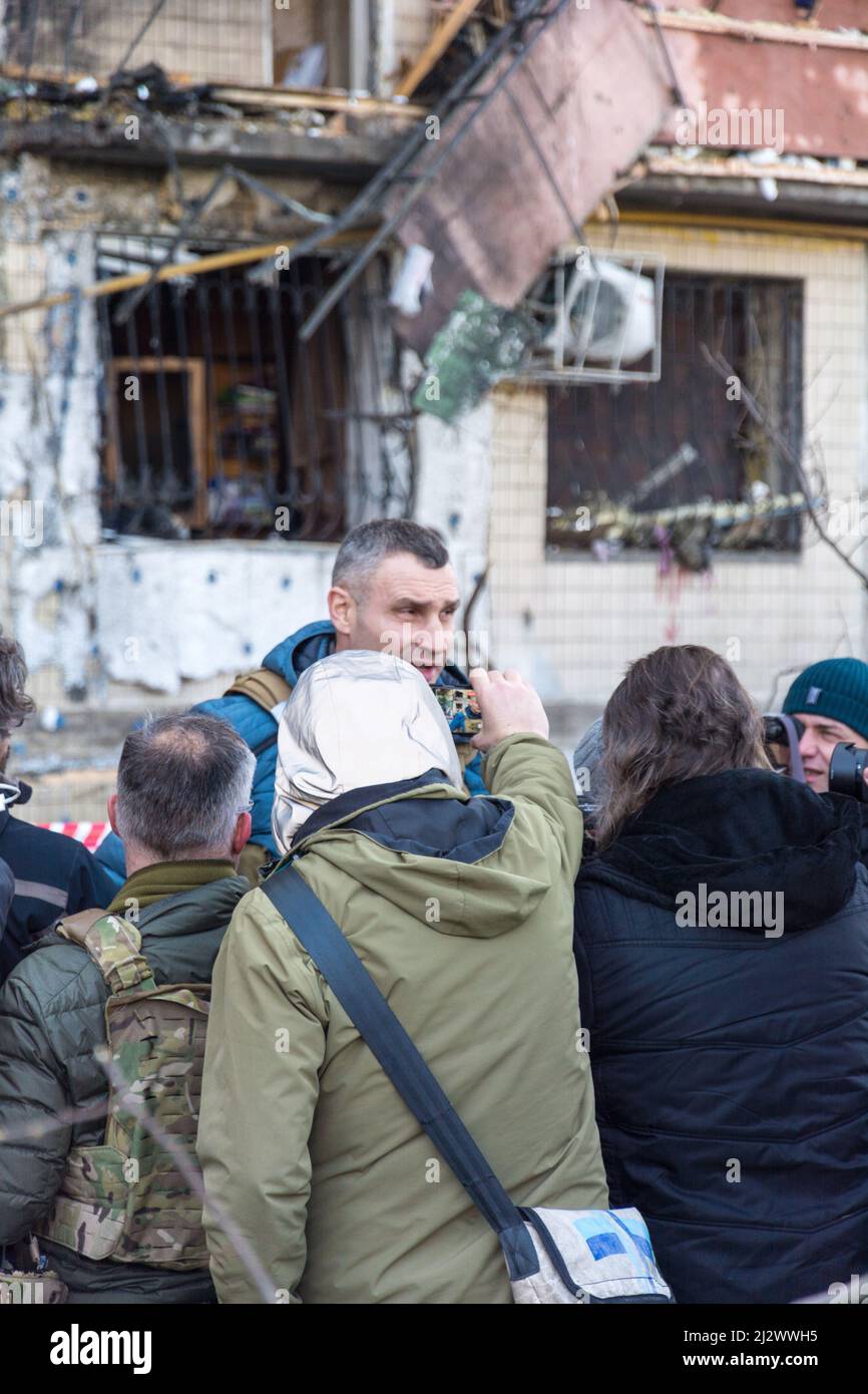 Kiev, Ukraine - March 14, 2022: Destruction of an apartment building in Kyiv, Ukraine. Vitali Klitschko, the mayor of besieged Kyiv, gives an intervie Stock Photo