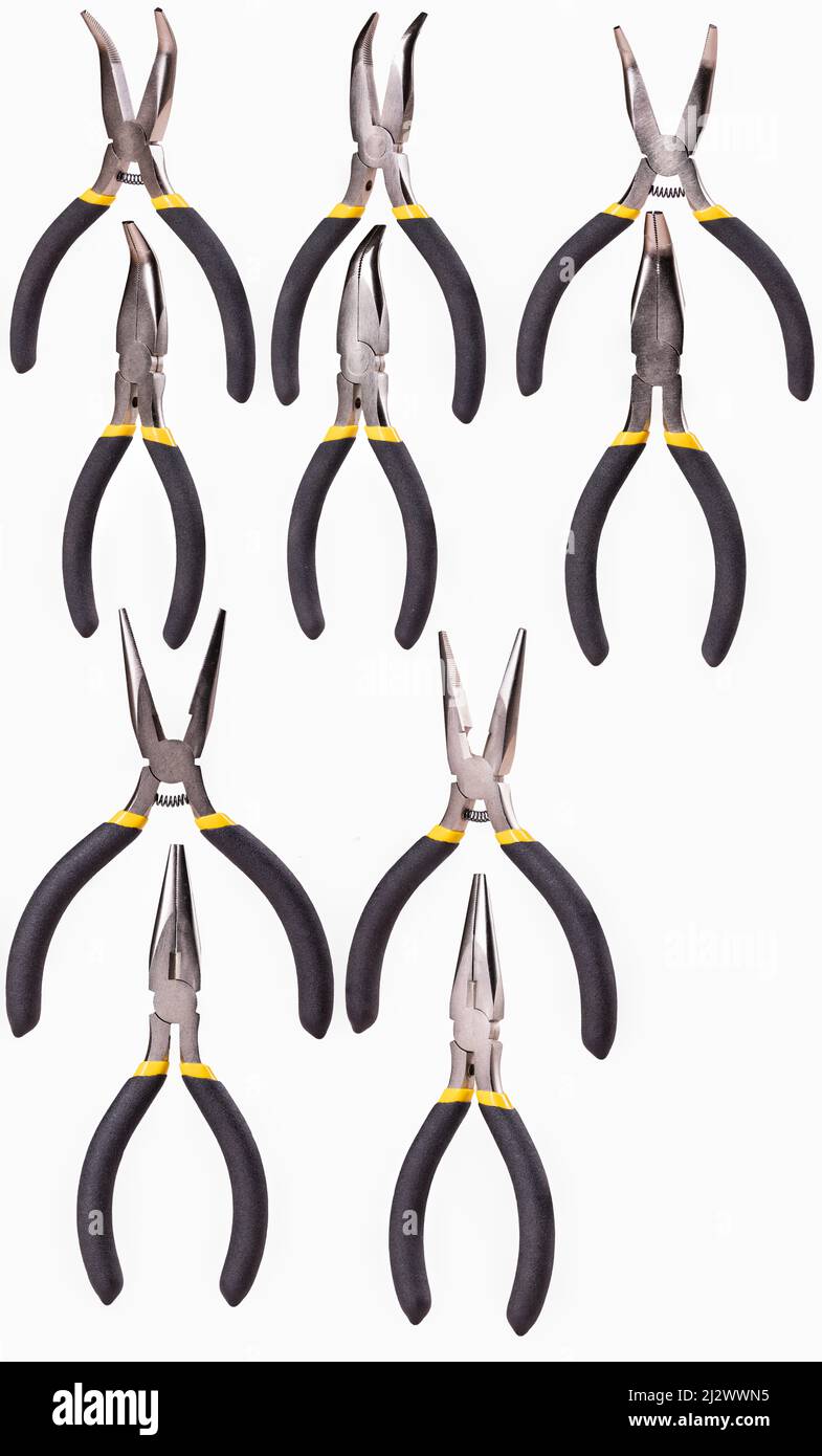 Various types of pliers used by precision mechanics. Isolated