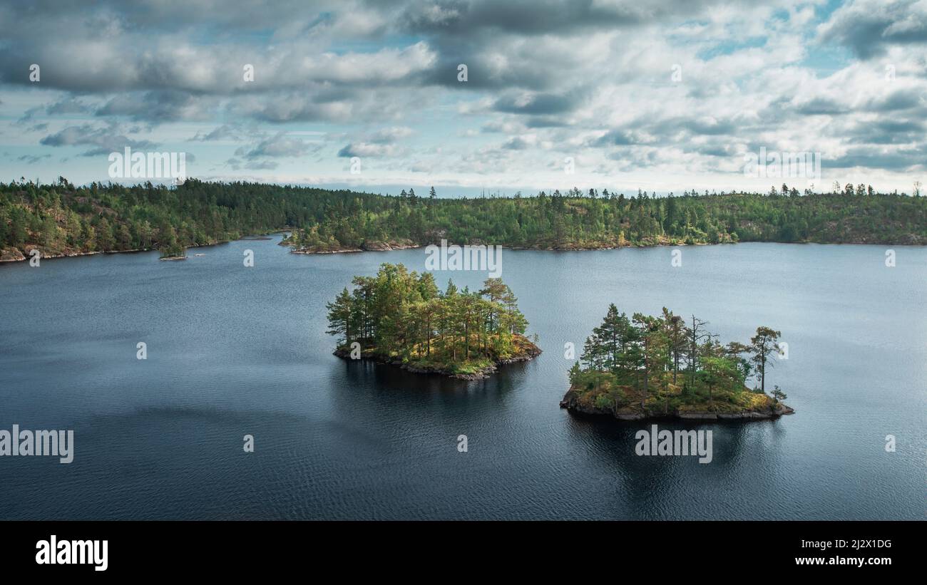 Small islands in Lake Stensjön in the Tyresta National Park in Sweden ...