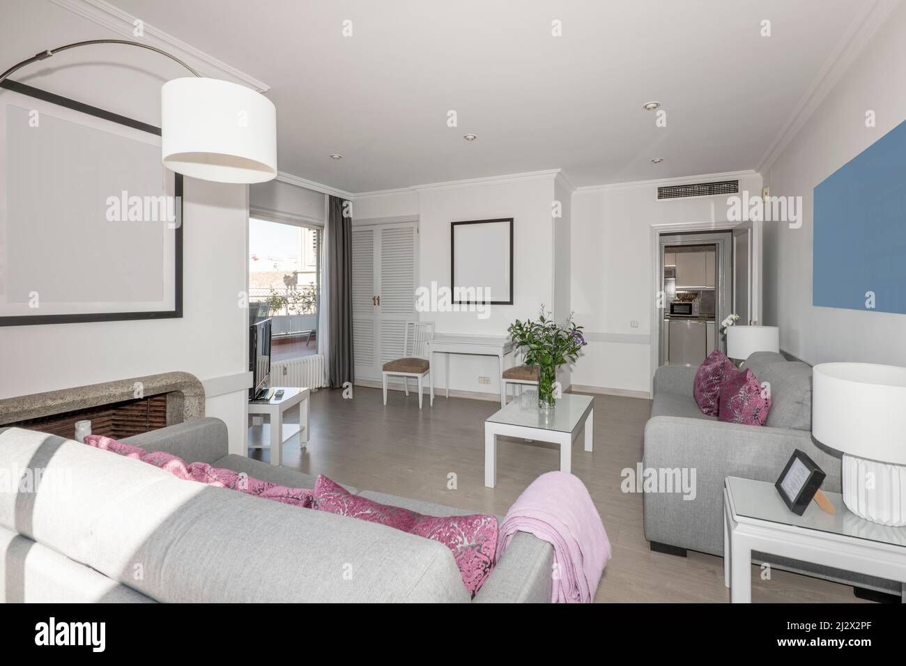 Living room of a vacation rental apartment with access to a terrace and