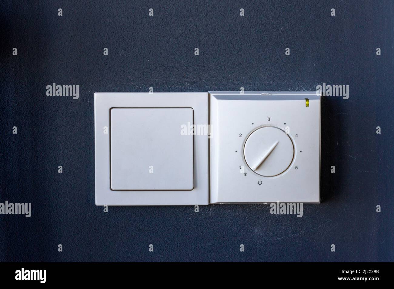 Light switch and underfloor heating adjustment switch Stock Photo Alamy