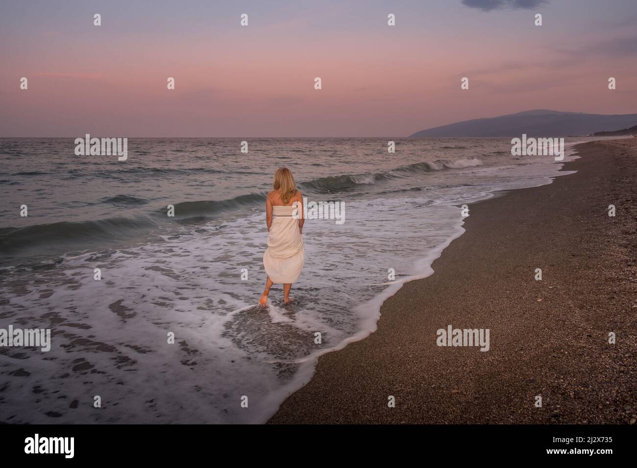 Barefoot woman white dress hi-res stock photography and images - Alamy