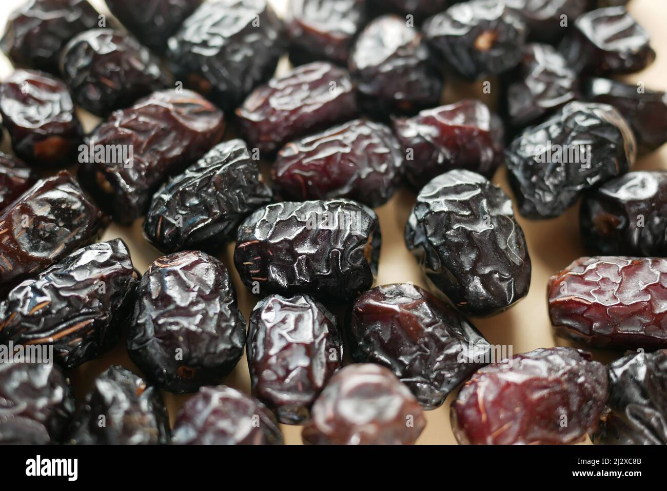 close up of fresh date fruit on table  Stock Photo