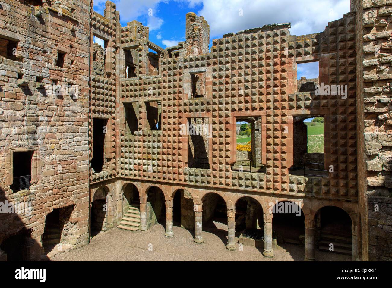 Inner courtyard of the ruins of Crichton Castle, Midlothian, sandstone, diamond facade, Scotland, UK Stock Photo