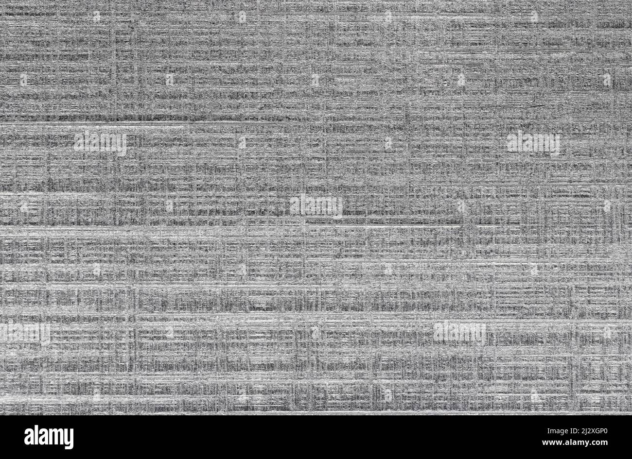 Textured brushed metallic background in silver color. Stock Photo