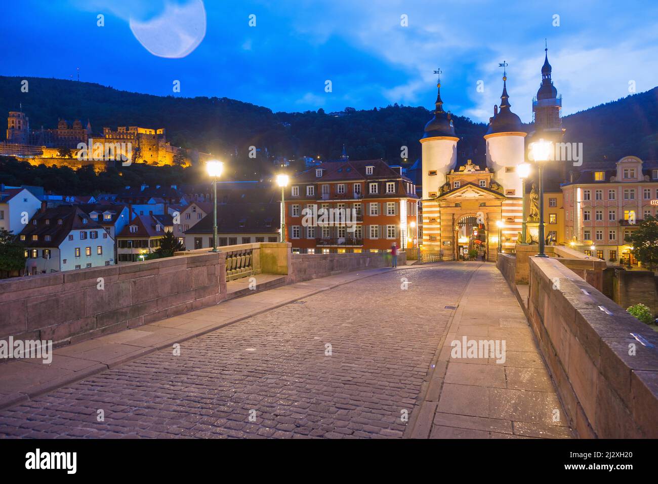 Heidelberg, view from Alter Brücke on the bridge gate, old town, Heiliggeistkirche and castle Stock Photo