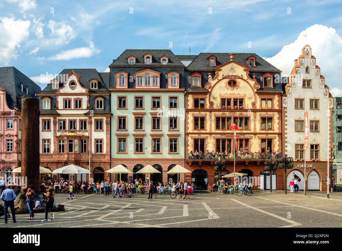 Mainz, Germany, May 21, 2018: some tourists in front of traditional houses in the old town Stock Photo