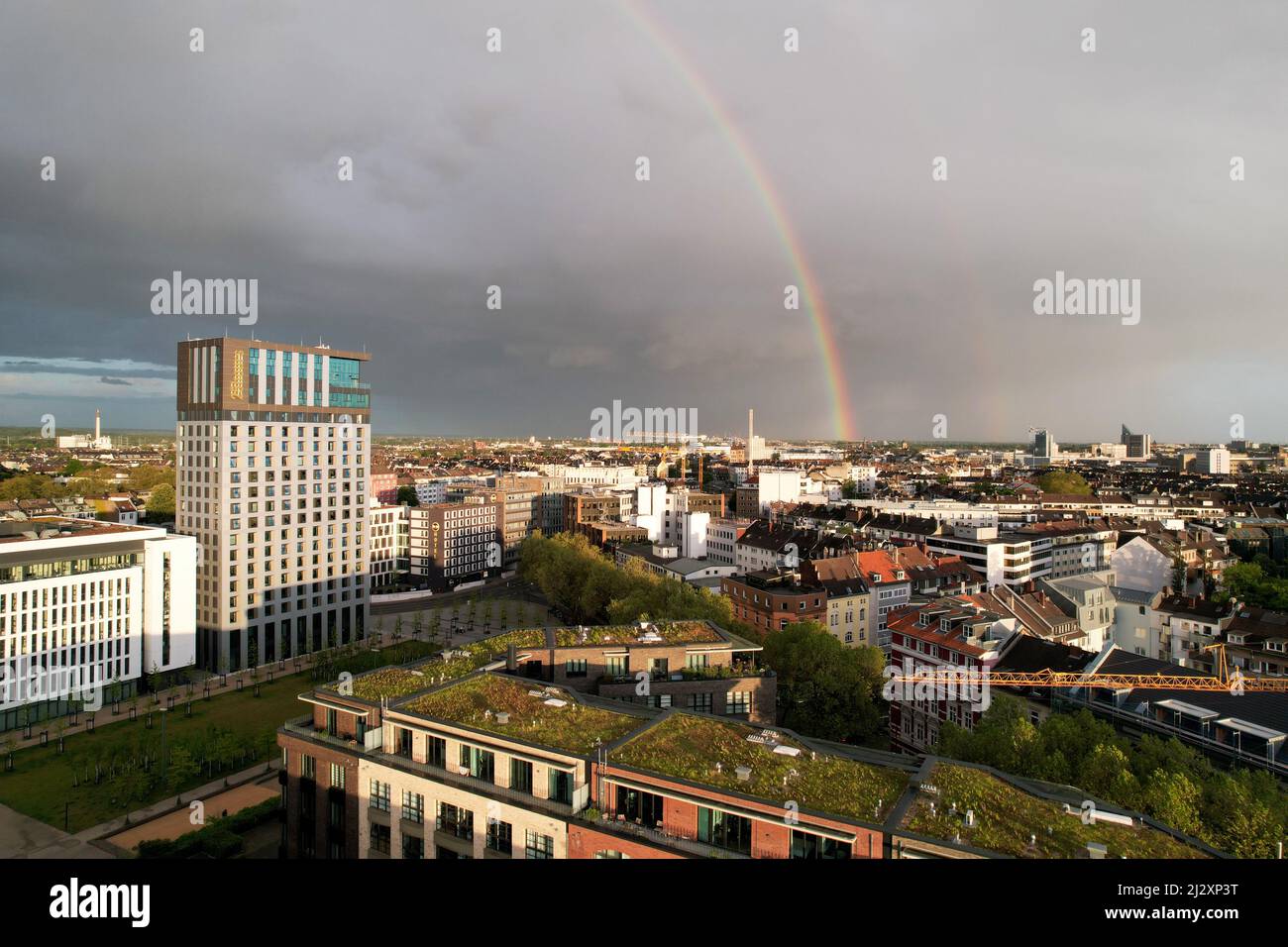An aerial view of Dusseldorf in Germany under a cloudy sky with a An aerial view of Dusseldorf in Germany under a cloudy sky with a