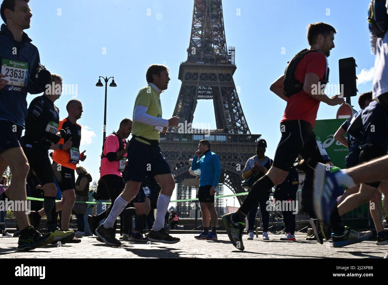 People run in the Schneider Electric Marathon de Paris 2022 held in Paris,  France on Apr. 3, 2022. (Photo by Lionel Urman/Sipa USA Stock Photo - Alamy