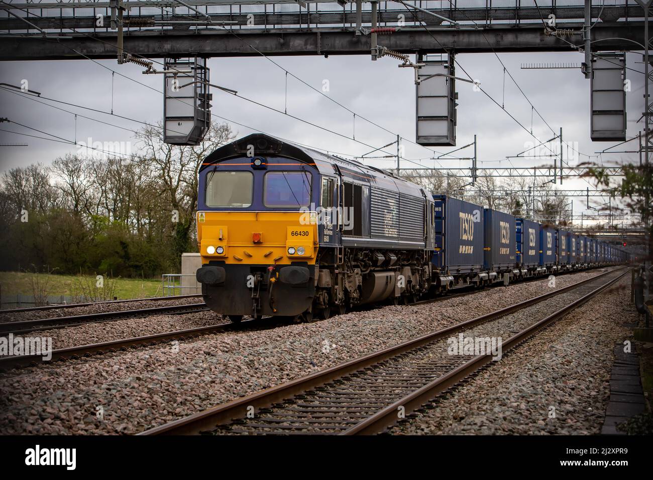 Direct Rail Services class 66 - 66430 heading north with the Tesco train via Cathiron nr Rugby. Stock Photo