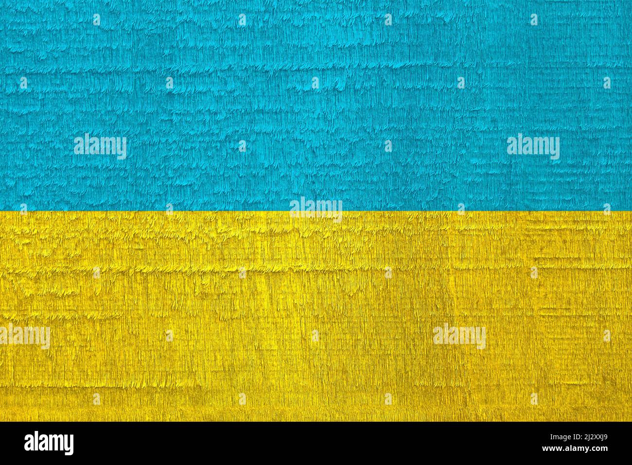 Flag of Ukraine with blue and yellow colors painted on the old dried wooden texture, Ukrainian national patriotic symbol of Independence, sovereignty Stock Photo