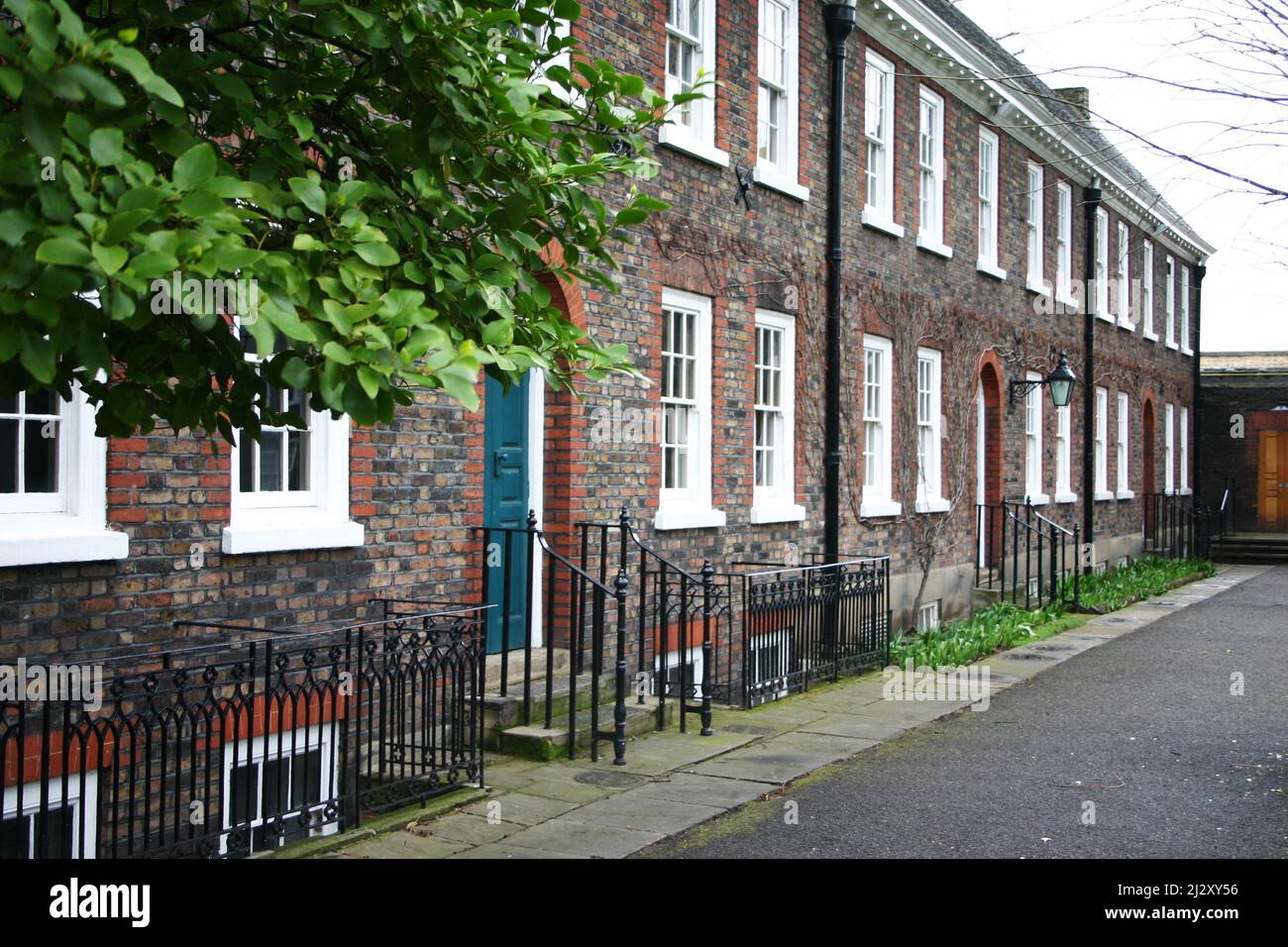 Traditional Terraced Houses, London. A row of old Georgian terraced town houses in central London. Stock Photo