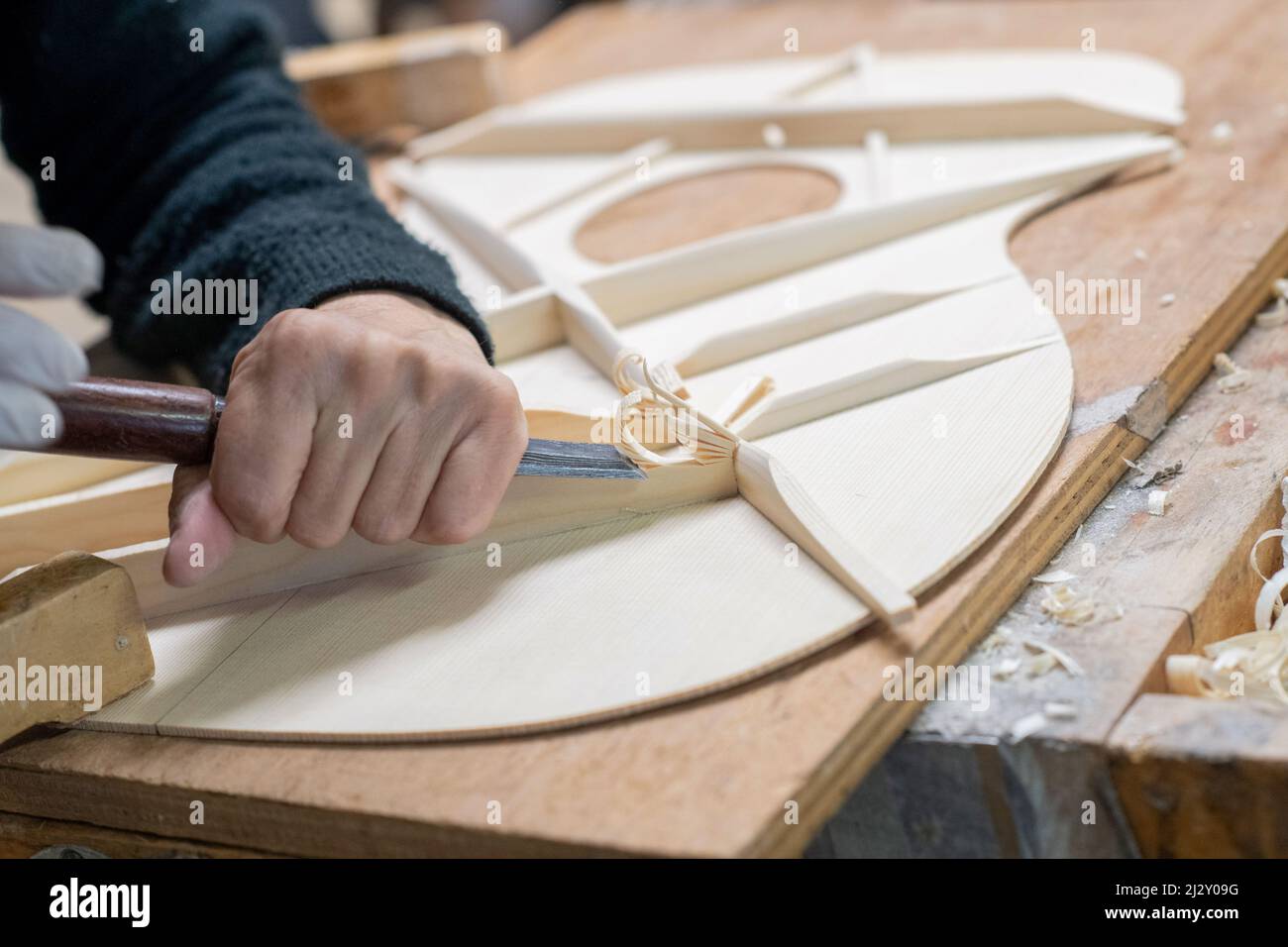 In Franck Cheval’s workshop, luthier in Saint-Michel-sur-Savasse (south-eastern France). Guitar making in the workshop of stringed-instrument maker Fr Stock Photo