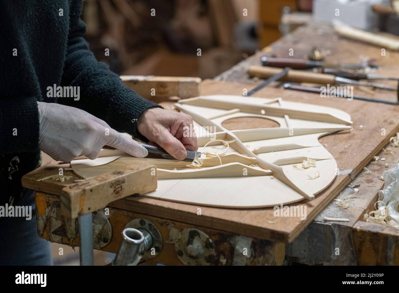 In Franck Cheval’s workshop, luthier in Saint-Michel-sur-Savasse (south-eastern France). Guitar making in the workshop of stringed-instrument maker Fr Stock Photo