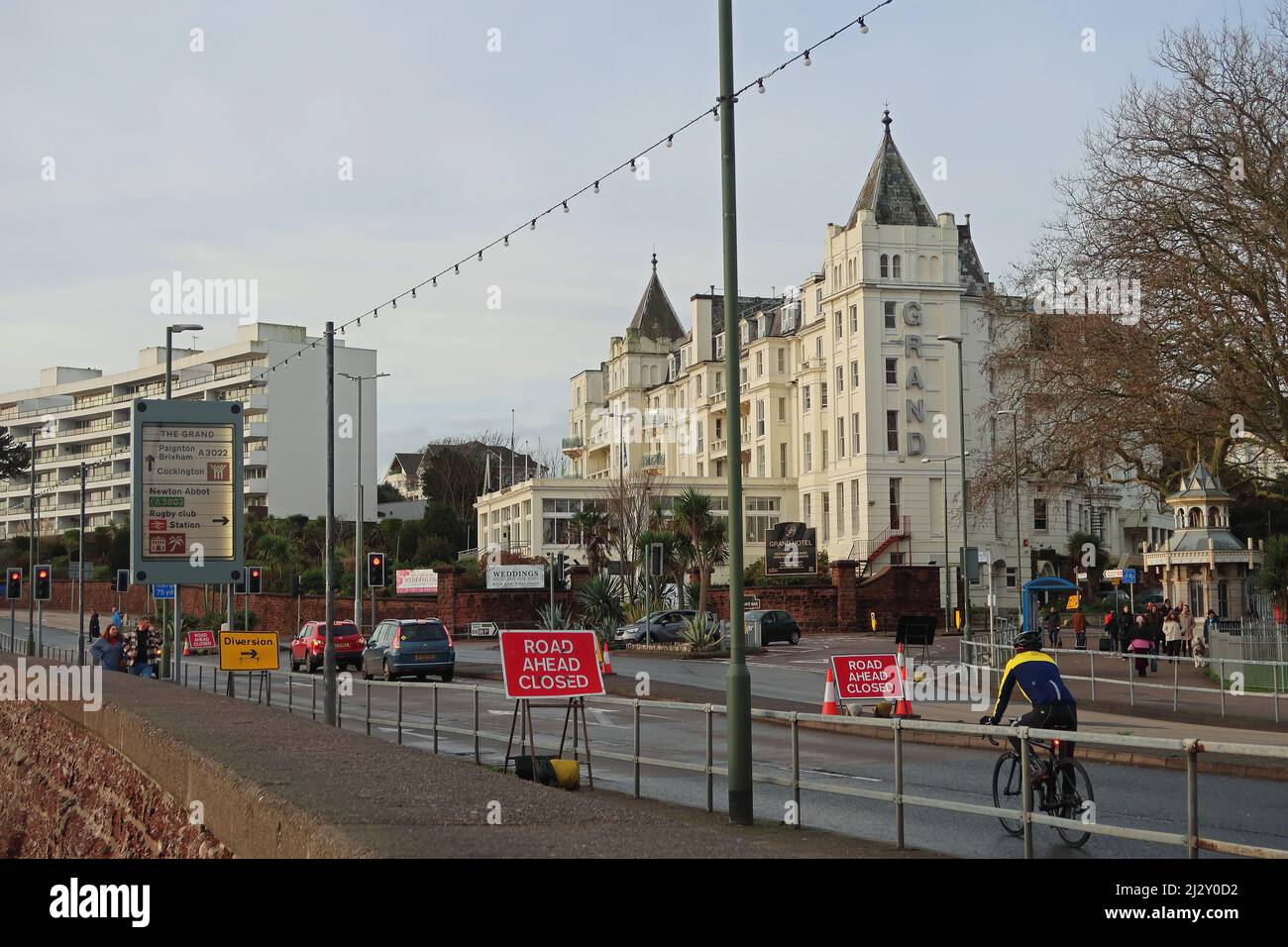 Road Ahead Closed signs on the A3022 seafront road opposite the Grand Hotel in Torquay, South Devon. Stock Photo