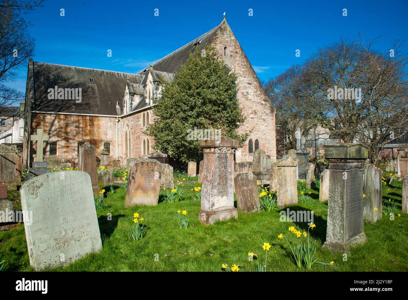 View of the Auld Kirk and graveyard on a Spring morning Stock Photo