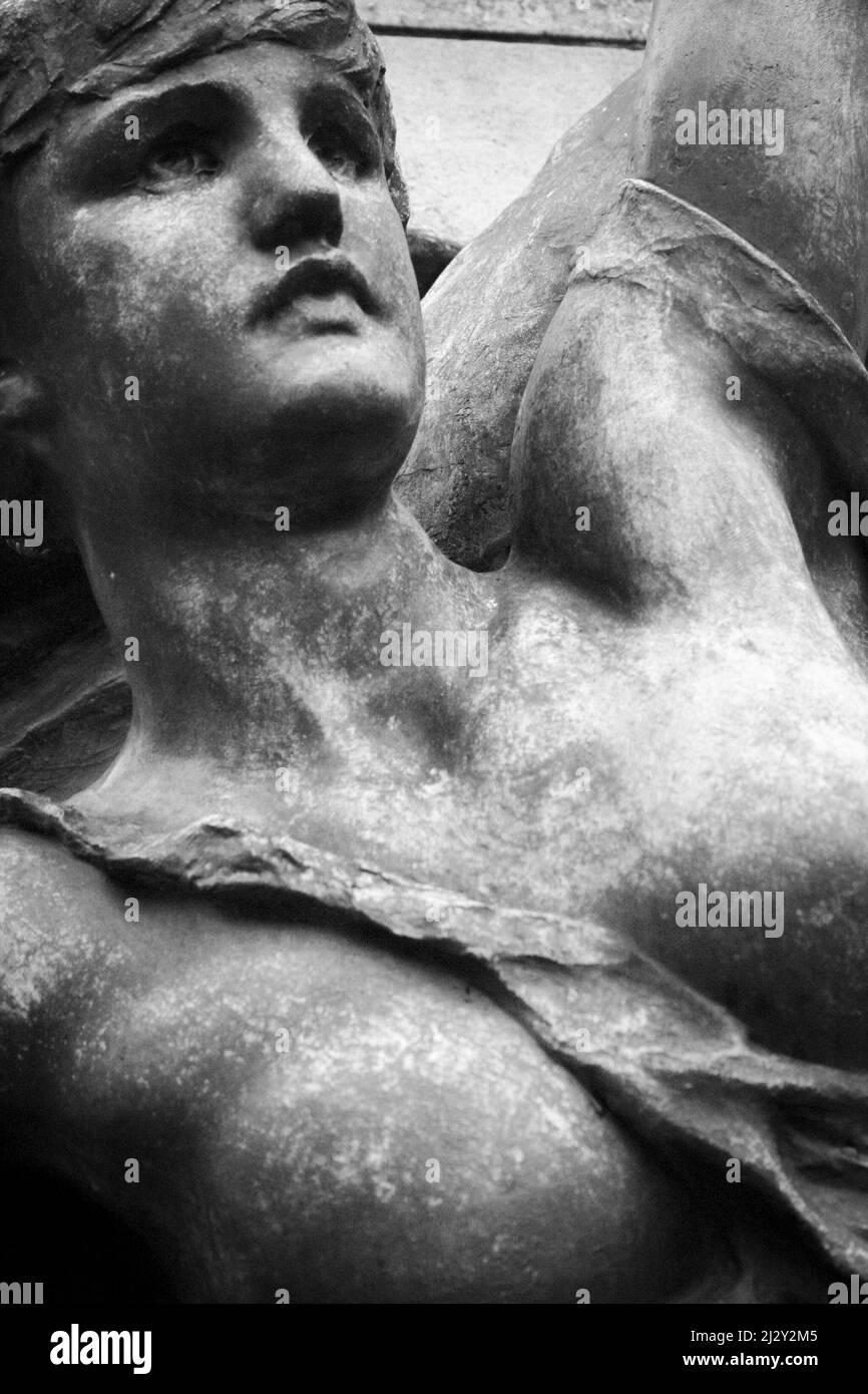 Female bust bronze. Close head and shoulder detail of a sepulchral statue of a woman in a London cemetery. Stock Photo
