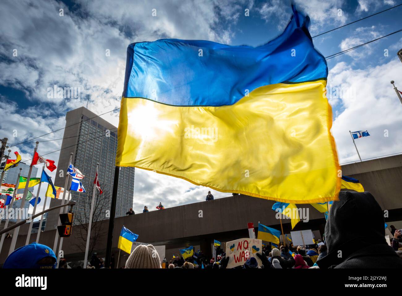 Ukrainian flags during an antiwar protest in downtown Toronto Stock