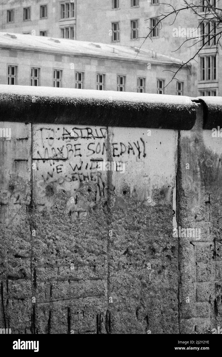 Berlin Wall, Germany. A historic detailed view of the Berlin wall with the poignant message, 'To Astrid, maybe someday we will be together'. Stock Photo