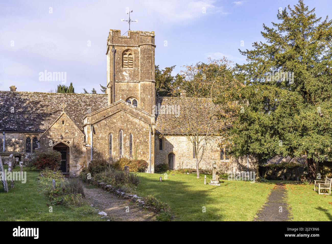 St Andrews church (dating back to the 12th century) in the Cotswold village of Sevenhampton, Gloucestershire, England UK Stock Photo