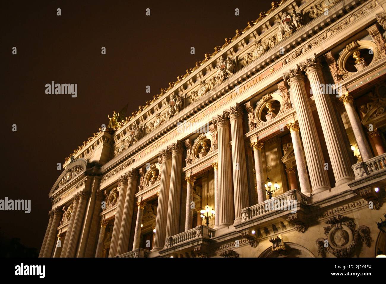 Opera Garnier, Paris Opera House. Low, wide angle night view to the Palais Garnier, home to the Opera National de Paris. Stock Photo