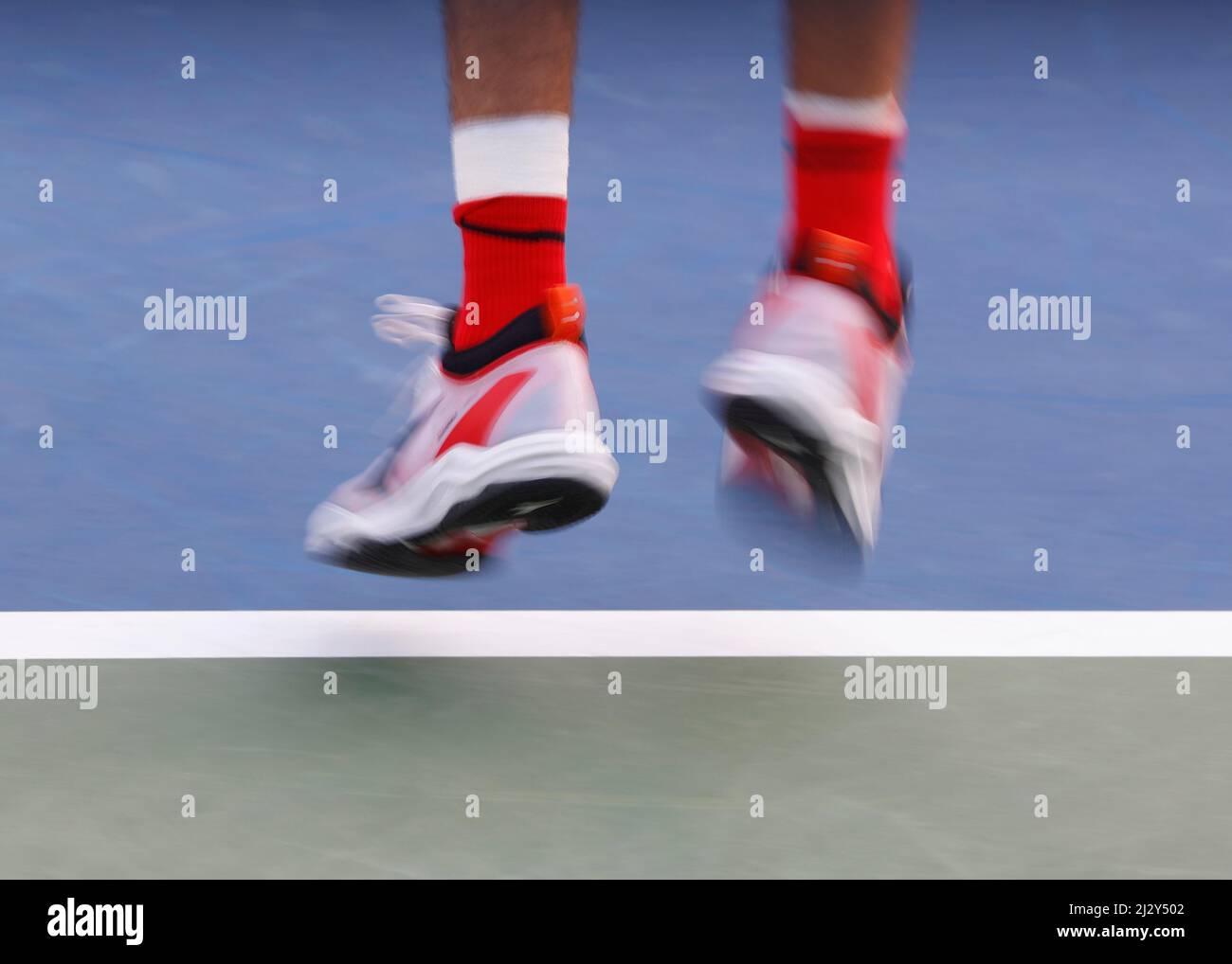 Close up of feet during serving game at the Dubai Tennis Championships 2022, Dubai, United Arab Emirates. Stock Photo