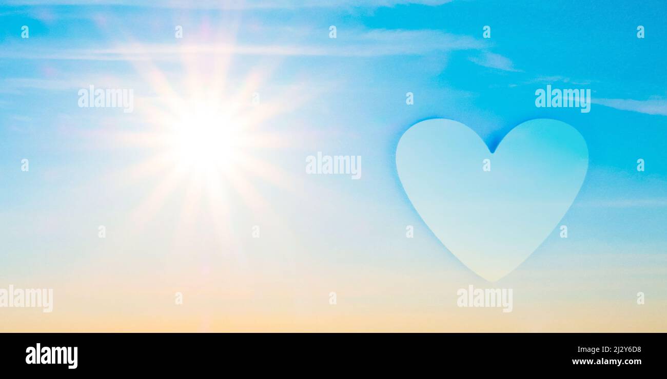 blue yellow sky of ukraine with sun heart symbol of love. Stock Photo