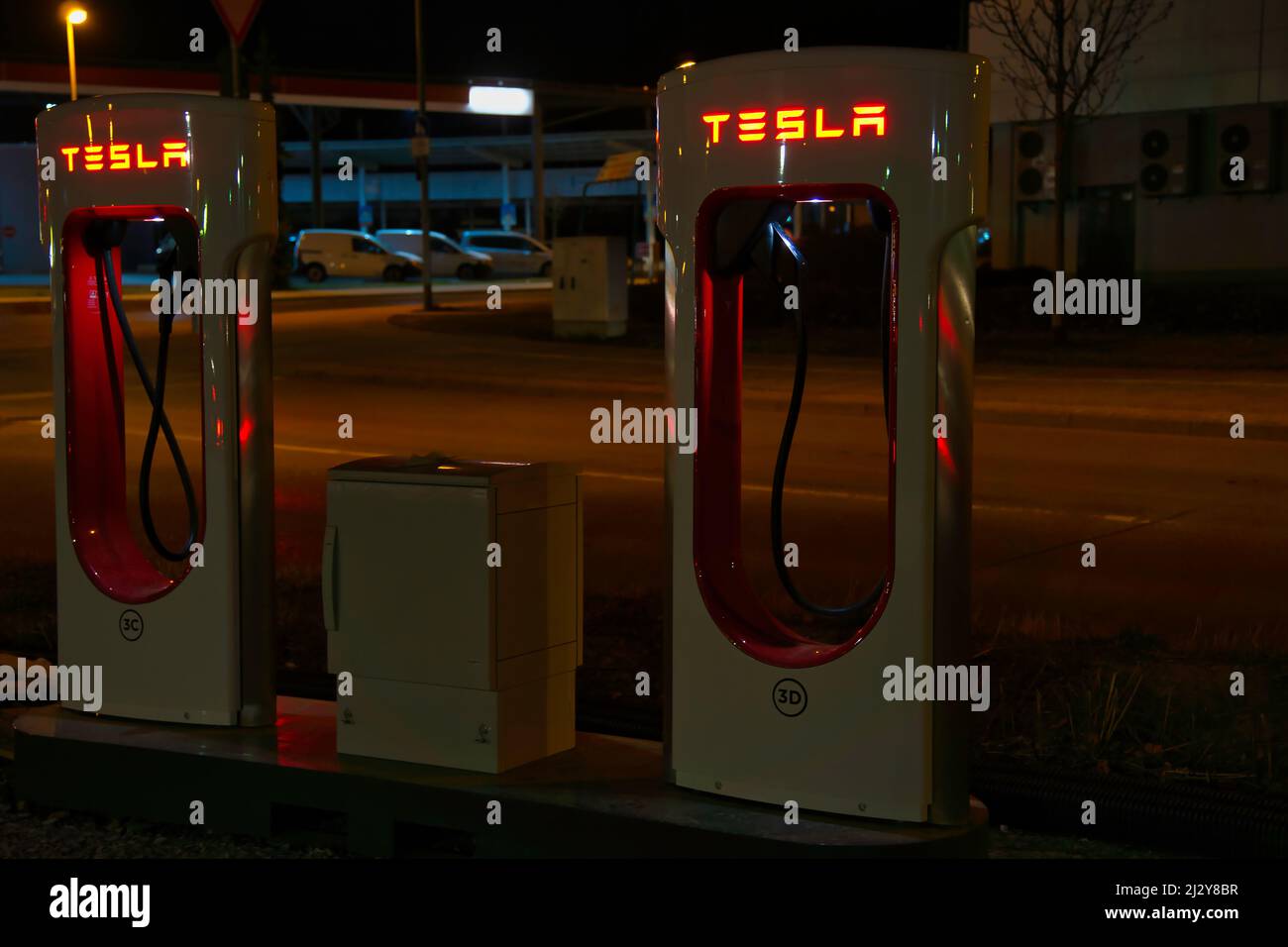 A Tesla charging station in Leonberg, Germany at night Stock Photo Alamy