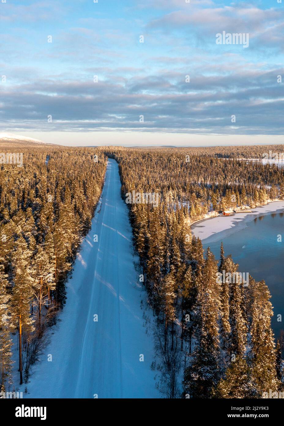 Snow-covered road at Särkijervi, Muonio, Lapland, Finland Stock Photo