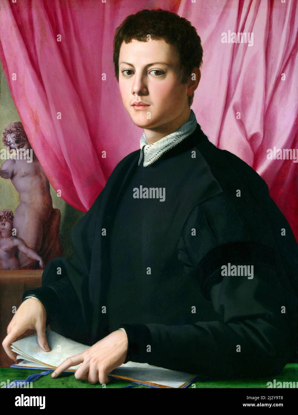 Portrait of a Young Man by Agnolo Bronzino (1503-1572), oil on wood, c. 1550-55. Stock Photo