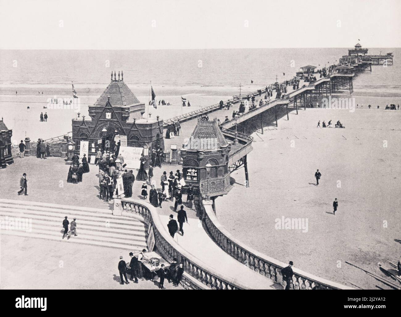 The pier at Skegness, Lincolnshire, England, seen here in the 19th century.  From Around The Coast,  An Album of Pictures from Photographs of the Chief Seaside Places of Interest in Great Britain and Ireland published London, 1895, by George Newnes Limited. Stock Photo