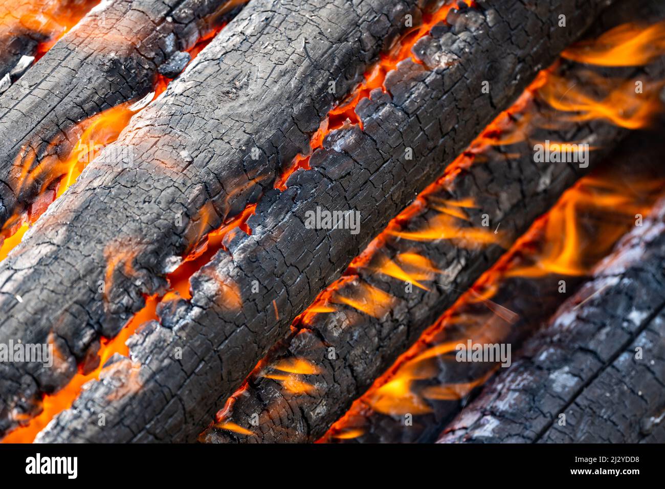 The hottest background. A fire blaze, heat and burning wood closeup