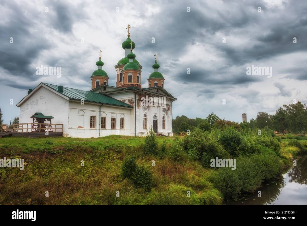 Smolensky Cathedral of Olonets located on a small island Mariam, lying below the confluence of the rivers Olonka and Megregi in Karelia, Russia in sum Stock Photo