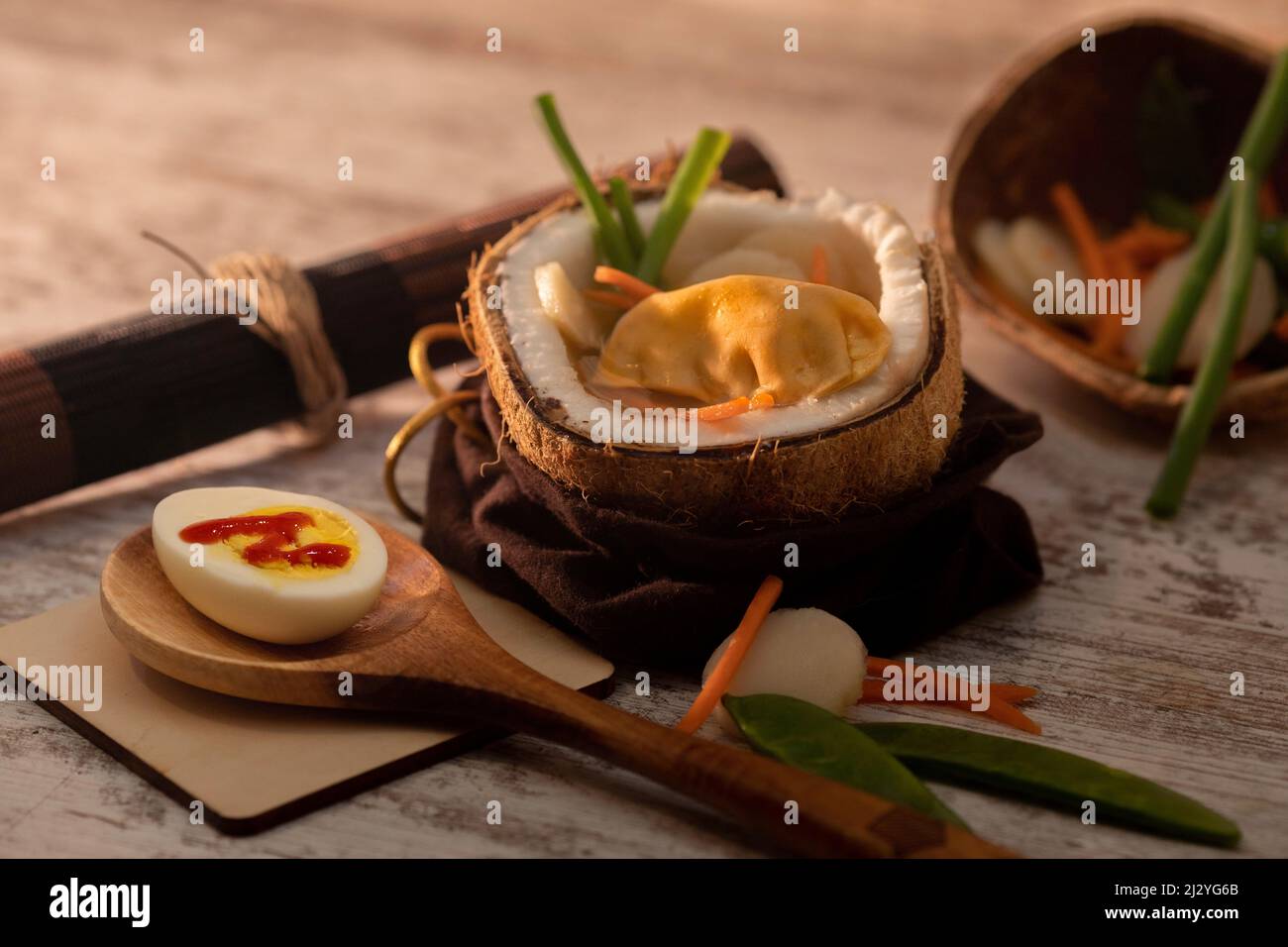Still life of Pot Sticker Soup with coconut Stock Photo