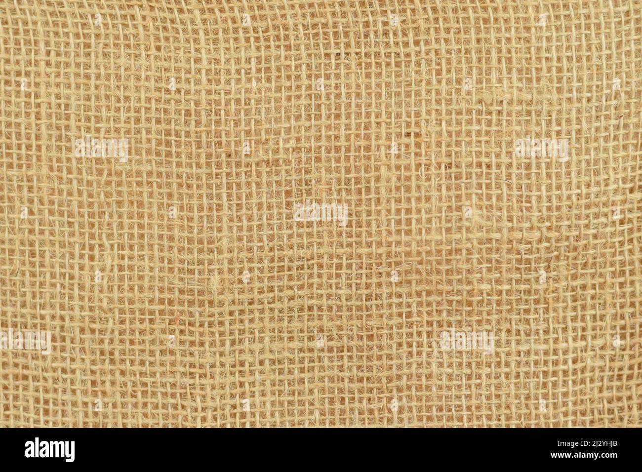 Burlap texture background. Brown sackcloth textile. Canvas. Stock Photo