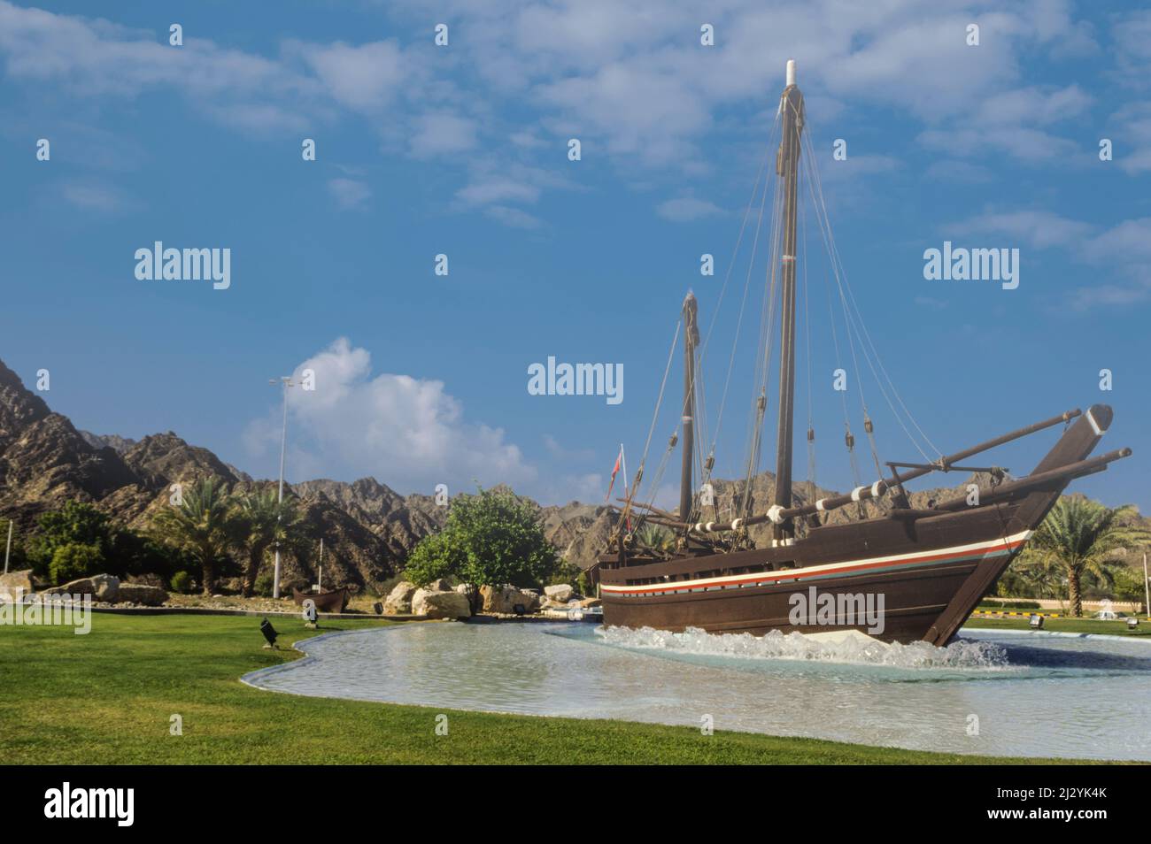 Muscat, Oman.  Omani Dhow, the Sohar, which sailed to China in 1980, duplicating an 8th.-century Omani voyage.  Al-Bustan Roundabout. Stock Photo