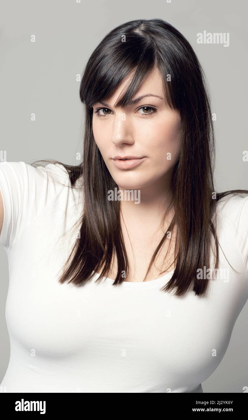 Naturally gorgeous. Studio shot of a plus-size model posing for the camera. Stock Photo