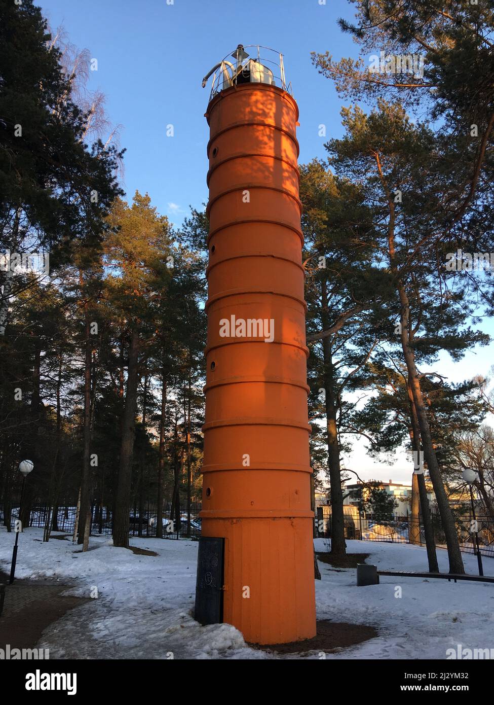Old soviet orange lighthouse on the shore of the Gulf of Finland in the city of Zelenogorsk, Russia Stock Photo