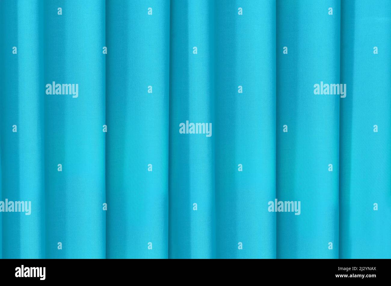 The horizontal background is draped with a blue cloth Stock Photo