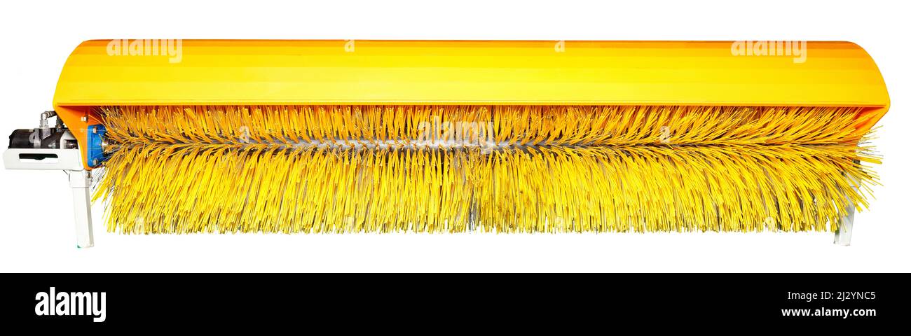 Sweeping circular brush as an attachment for a communal sweeper or tractor. Stock Photo