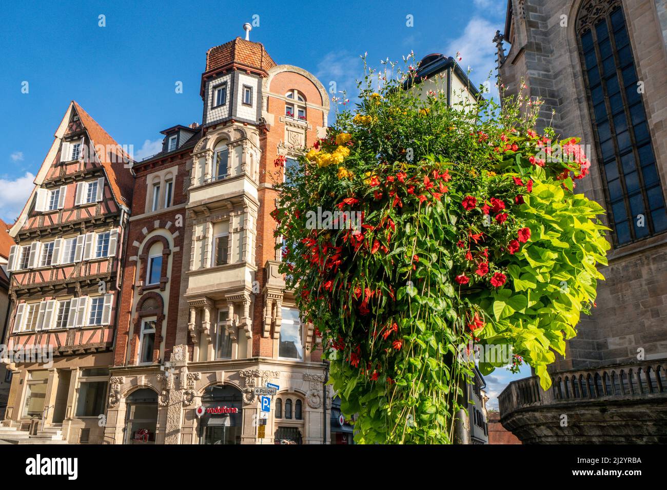 Medieval facades in the historic center of Tuebingen at the collegiate church St. Georg, Baden Wuerttemberg, Germany Stock Photo