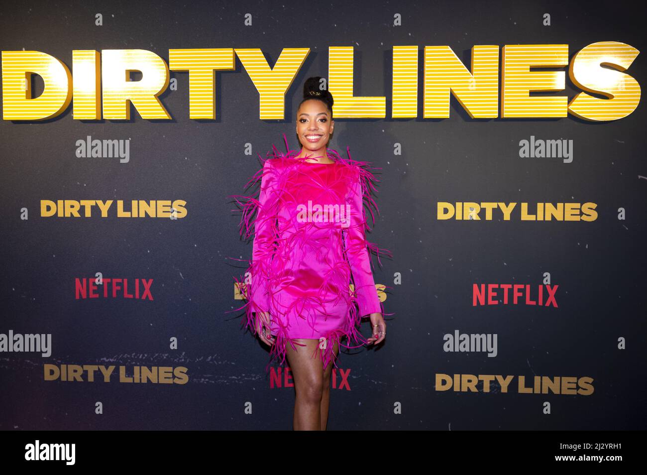 2022-04-04 18:16:15 AMSTERDAM - Joy Delima on the red carpet for the  premiere of the Netflix series Dirty Lines. The Dutch series is about life  in Amsterdam in the 1980s. ANP KIPPA