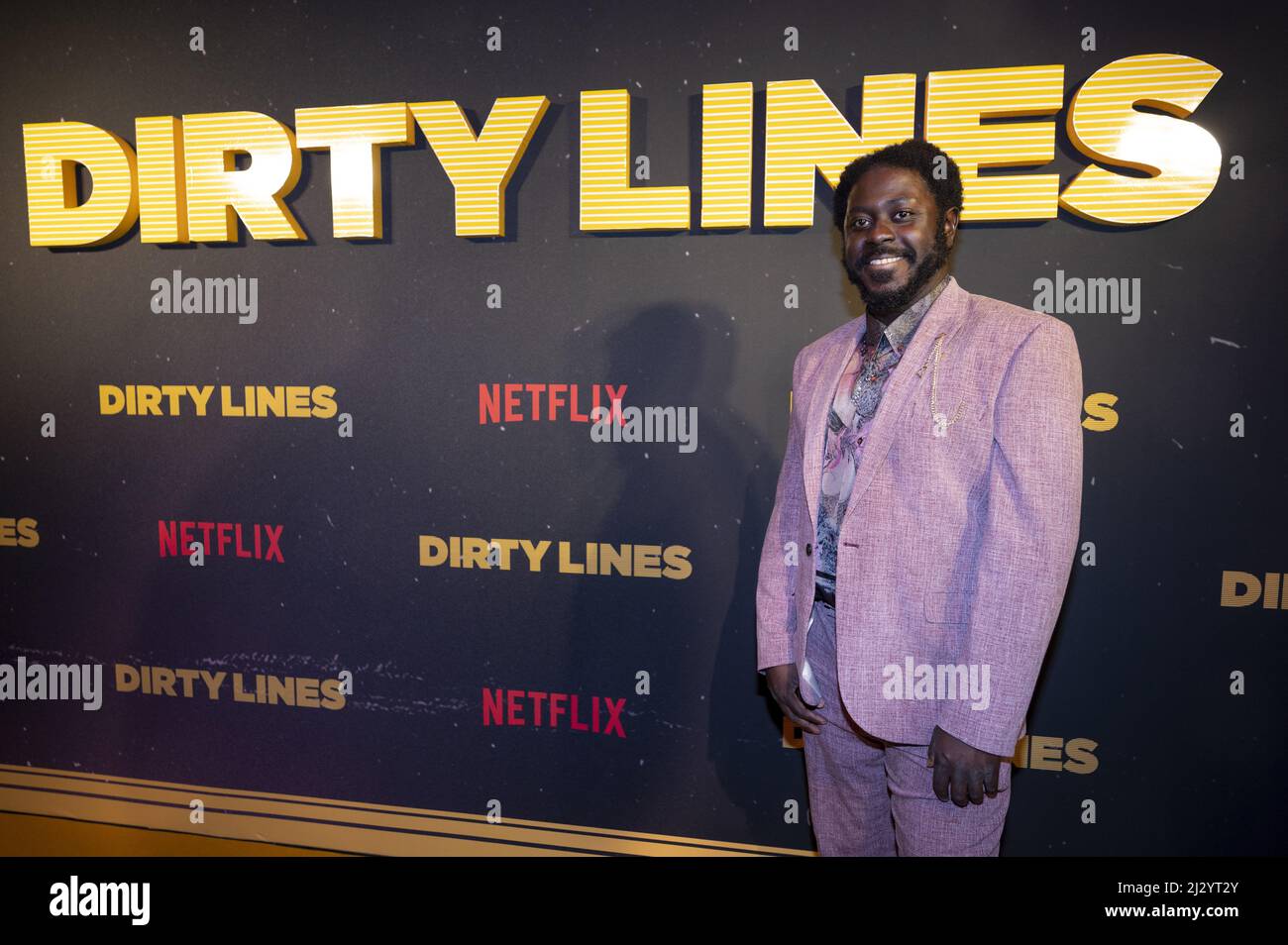 2022-04-04 18:19:35 AMSTERDAM - Andre Dongelmans on the red carpet for the premiere of the Netflix series Dirty Lines. The Dutch series is about life in Amsterdam in the 1980s. ANP KIPPA EVERT ELZINGA netherlands out - belgium out Stock Photo