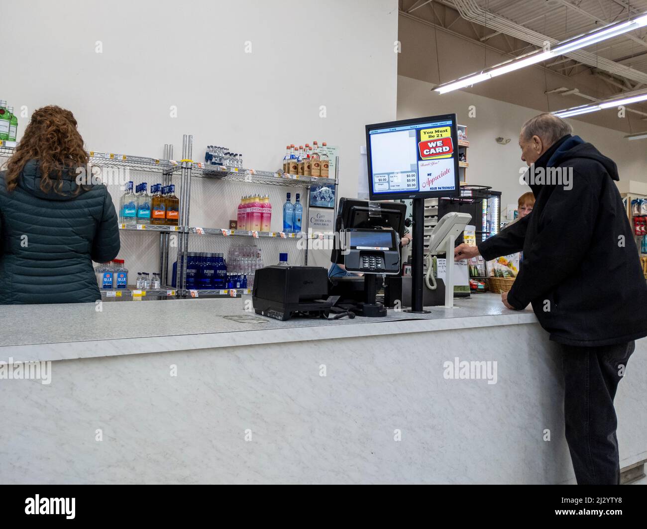 Gold Bar, WA USA circa January 2022 Elderly man buying a lottery