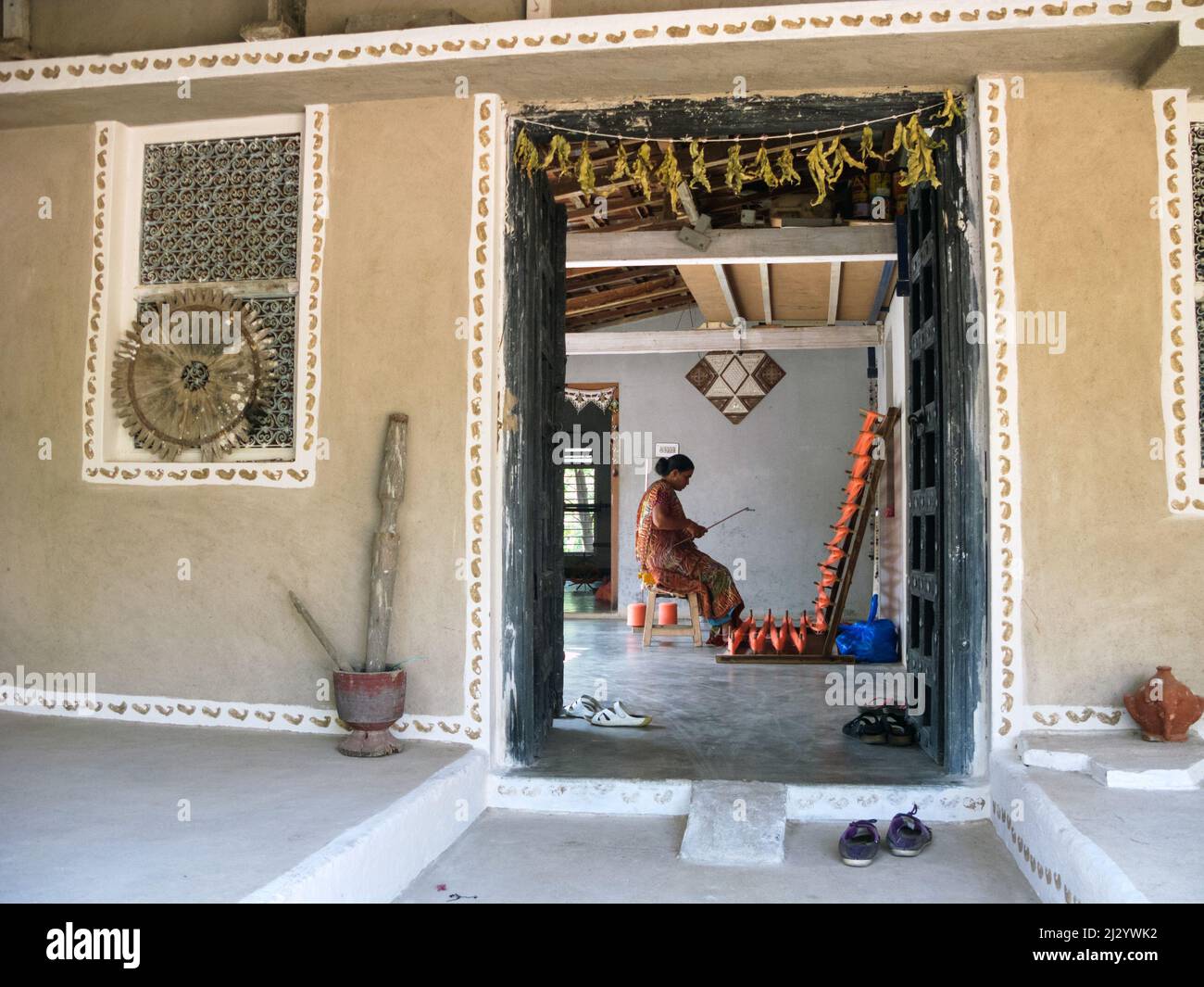 India, Gujarat, Kutch, Handloom Design Center in Bhujodi. Decorations around the white frames are made by printing with the edge of the hand. I Stock Photo