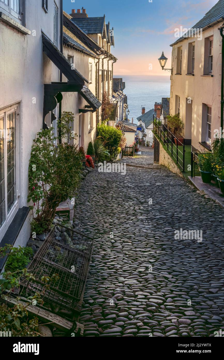 One of the picturesque cobbled streets to be found in the historic North Devon fishing village of Clovelly. Stock Photo
